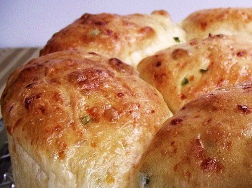 /><br/> <br/> This makes 12 BIG soft rolls, and I mean BIG. I think when I make them again, I'm going to opt for making regular size rolls and make 2 dozen. One of these rolls cut in half will be plenty for Bob and me.<br/> <br/> I did try a small piece of one and really do like the flavor. I'm glad I doubled the jalapeno...1/4 cup wouldn't have even been noticed in the roll. They're soft and light in texture with little pockets of cheddar here and there....I think I'll use pepperjack cheese the next time I make them.<br/> <br/> Overall, I'm pleased with the way they turned out. I'll keep one up here to go with dinner-the rest are going into the freezer. They'll be a nice side with a southwestern salad, soup or chili.<br/> <br/> You know, the more I think about it.......I do believe I'm going to make loaves of bread out of this the next time......I bet it would make awesome sandwiches. I think it would be great for a BLT.......Mmmmmmmm......that sandwich would ROCK!<br/> <br/> <br/> Thanks to the challenge Sue put up.........I got to make some bread-that's always a good day for me.<br/> <br/> <br/> Carol<br/> <br/> <br/> <img src=